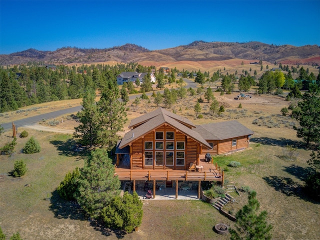 drone / aerial view featuring a mountain view