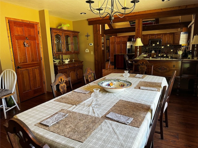 2378 Lake Creek Rd, Troy, MT 59935 - dining room with a chandelier and dark wood-style flooring