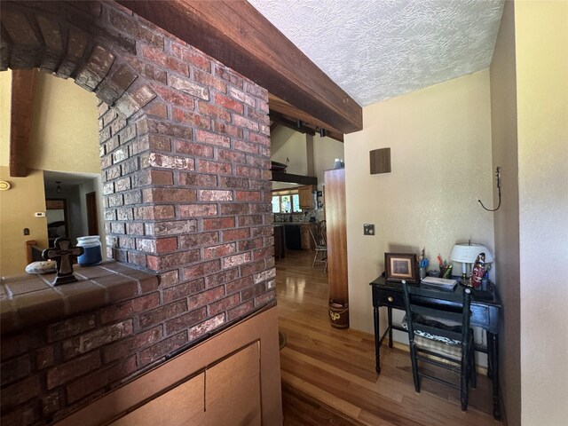 2378 Lake Creek Rd, Troy, MT 59935 - hallway with wood finished floors and a textured ceiling
