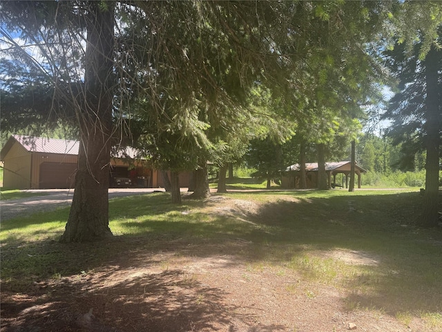 2378 Lake Creek Rd, Troy, MT 59935 - view of grassy yard with a garage and a gazebo