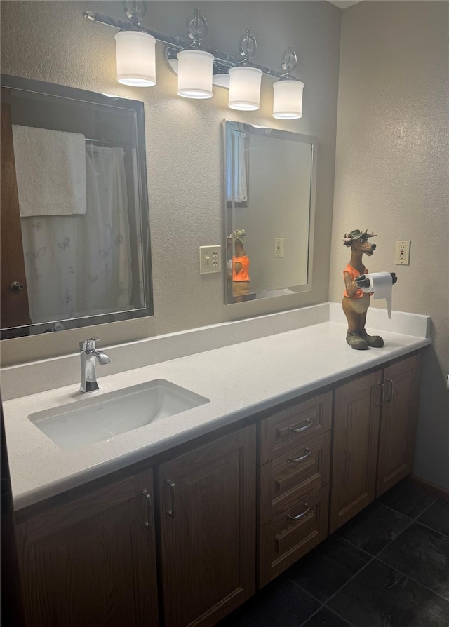 2378 Lake Creek Rd, Troy, MT 59935 - bathroom featuring vanity and tile patterned flooring