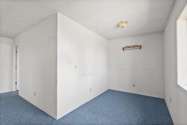 unfurnished room with carpet