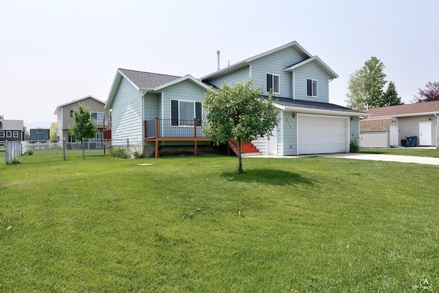 view of front of property featuring a garage, a wooden deck, and a front lawn