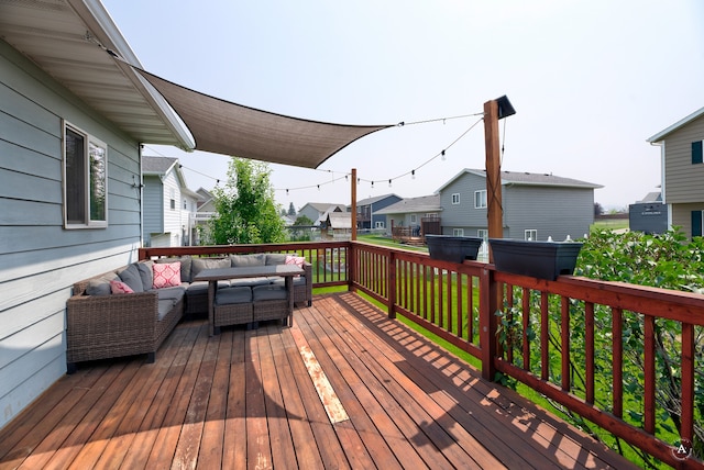 wooden deck featuring an outdoor hangout area