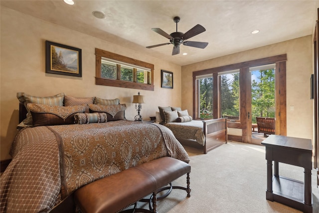 bedroom with access to exterior, recessed lighting, light colored carpet, and ceiling fan