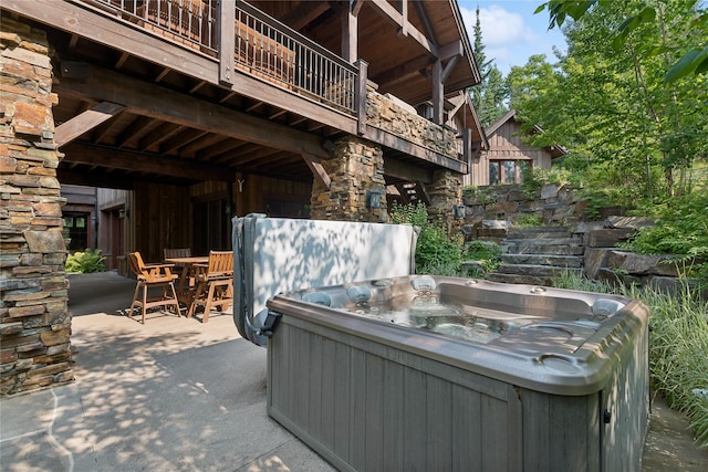 view of patio featuring a hot tub