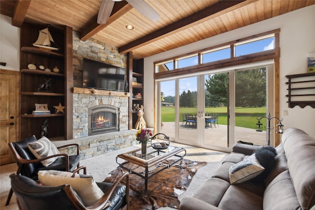 living area featuring built in features, beam ceiling, french doors, a fireplace, and wooden ceiling