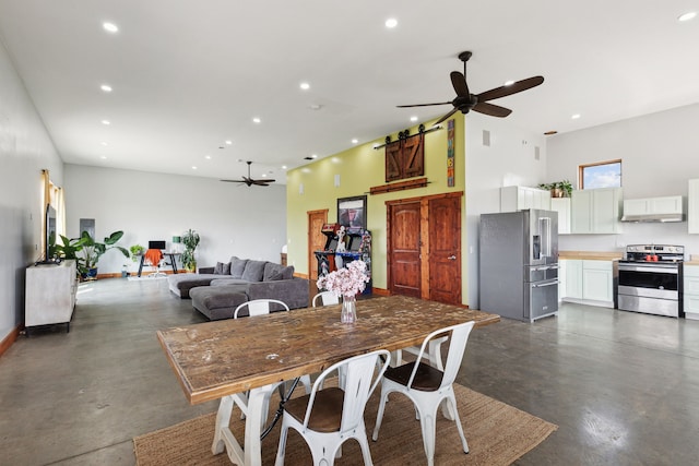 dining area with a barn door