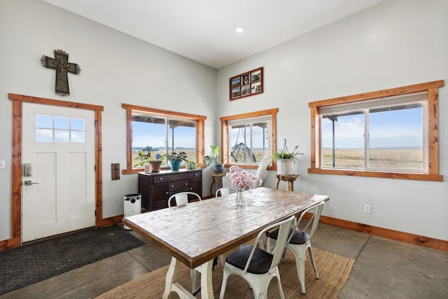 dining room featuring concrete flooring