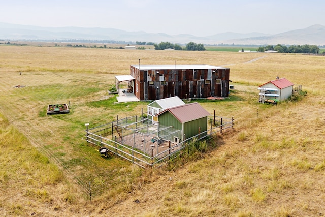 aerial view featuring a mountain view and a rural view