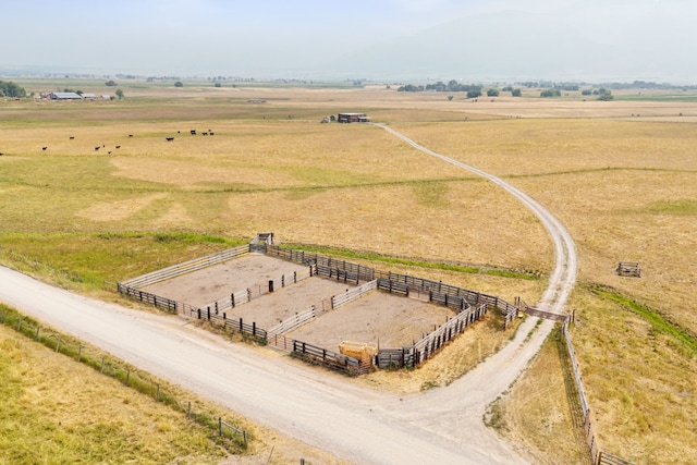 birds eye view of property featuring a rural view