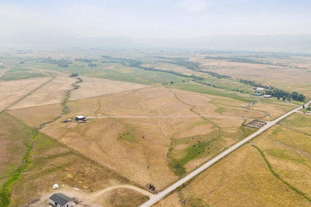 birds eye view of property featuring a rural view