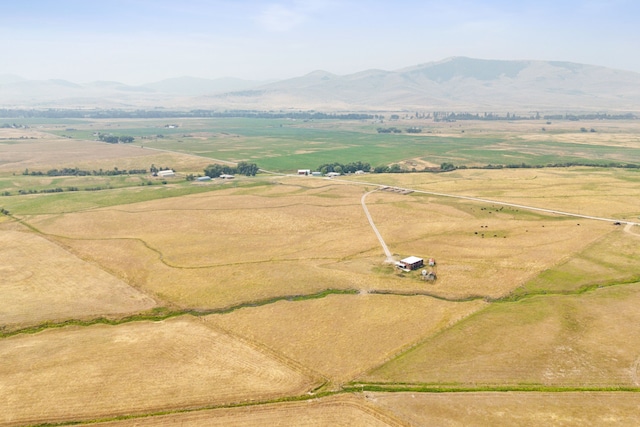 bird's eye view featuring a mountain view and a rural view