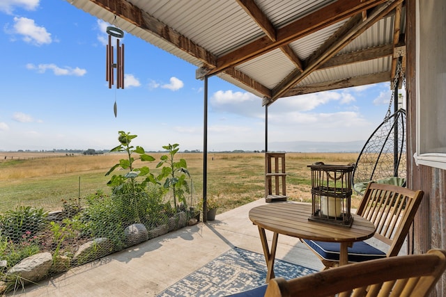 view of patio with a rural view