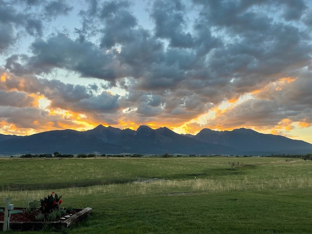 view of mountain feature with a rural view