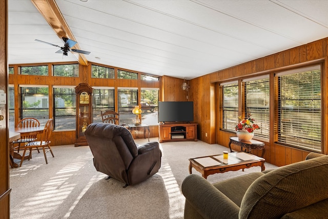 interior space featuring lofted ceiling with beams and ceiling fan