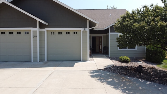 craftsman house with a garage