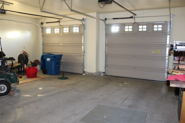 garage featuring a garage door opener