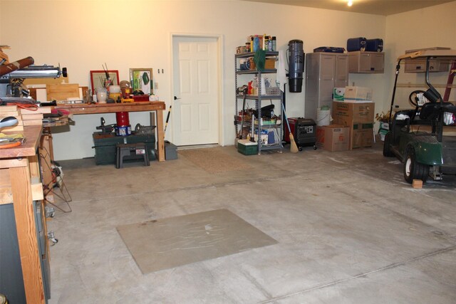 garage featuring a workshop area