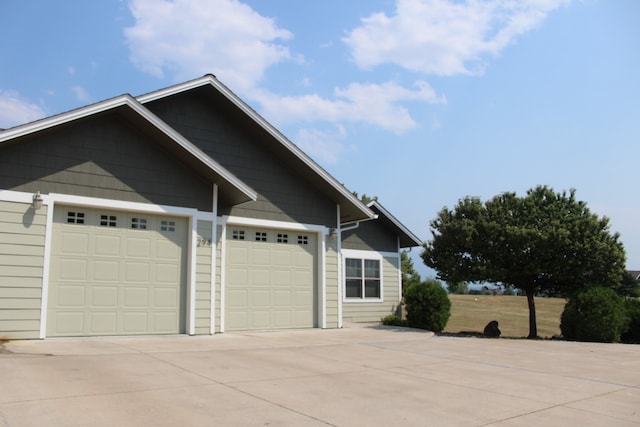 view of home's exterior featuring a garage