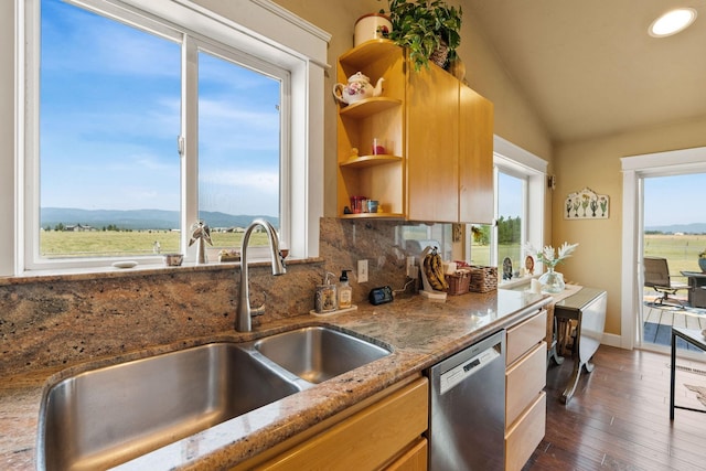 881 Lone Coyote Trl, Kalispell, MT 59901 - kitchen with dishwasher, open shelves, backsplash, lofted ceiling, and dark wood-type flooring