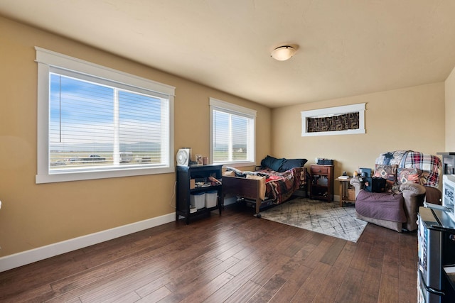 881 Lone Coyote Trl, Kalispell, MT 59901 - bedroom with baseboards and wood finished floors