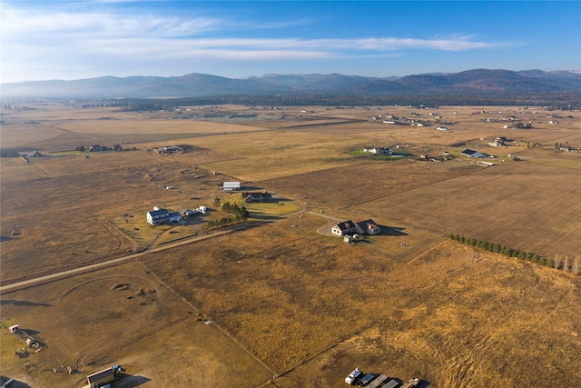 881 Lone Coyote Trl, Kalispell, MT 59901 - aerial view of property's location featuring mountains and rural landscape