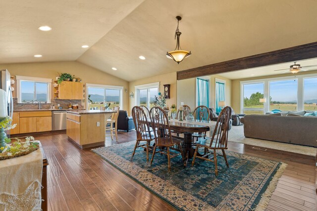 881 Lone Coyote Trl, Kalispell, MT 59901 - dining area with dark wood finished floors, recessed lighting, and vaulted ceiling