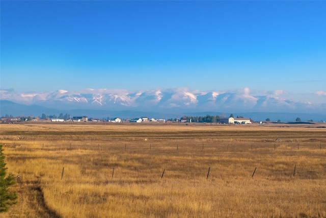 881 Lone Coyote Trl, Kalispell, MT 59901 - property view of mountains featuring a rural view