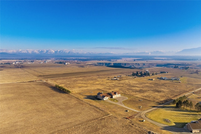 881 Lone Coyote Trl, Kalispell, MT 59901 - overview of rural landscape with mountains