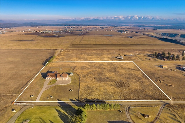 881 Lone Coyote Trl, Kalispell, MT 59901 - overview of rural landscape featuring a mountainous background and property parcel outlined