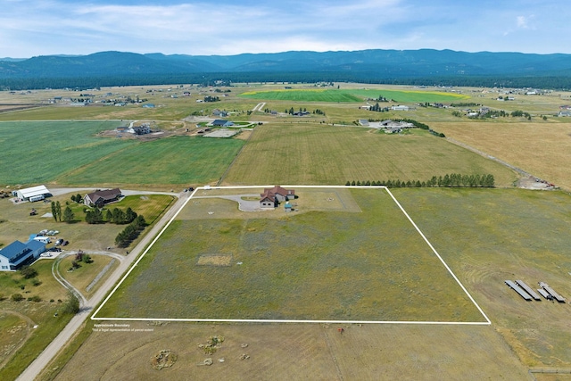 881 Lone Coyote Trl, Kalispell, MT 59901 - aerial view with a rural view and a mountain view