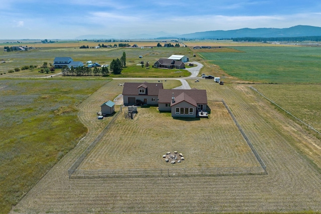 881 Lone Coyote Trl, Kalispell, MT 59901 - overview of rural landscape featuring a mountain backdrop
