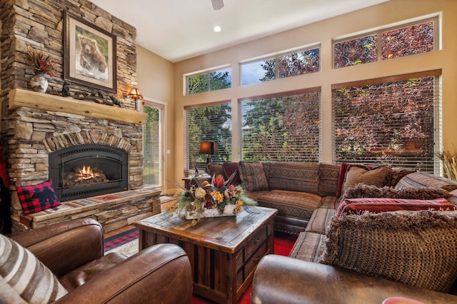 living room with wood-type flooring and a fireplace