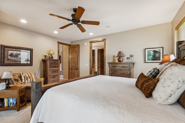 carpeted bedroom with ceiling fan