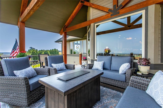 wooden deck with an outdoor hangout area