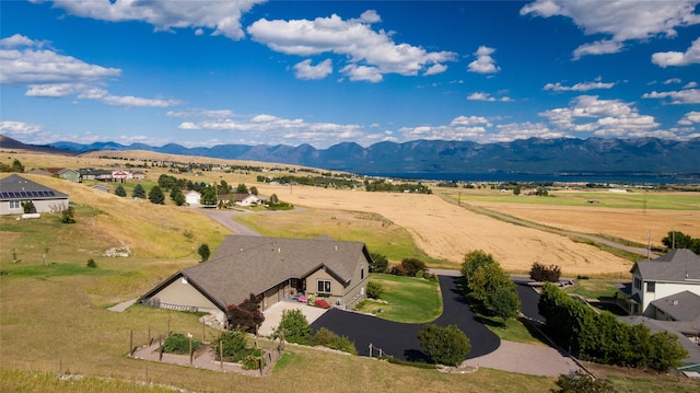 birds eye view of property featuring a rural view and a mountain view