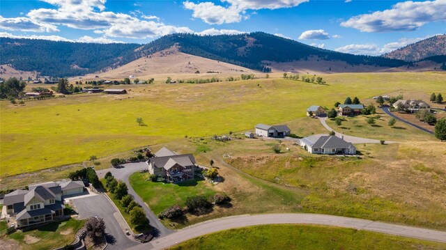 birds eye view of property featuring a rural view and a mountain view