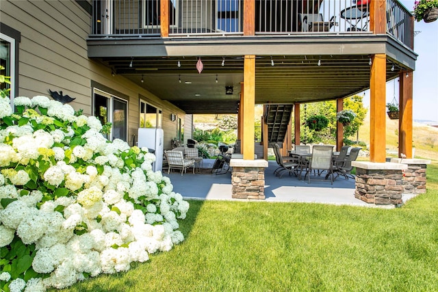 view of patio featuring stairs