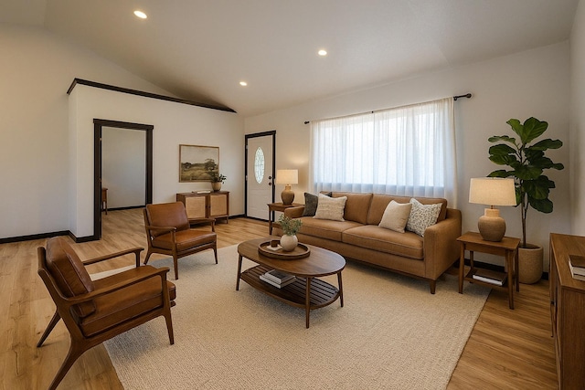 72 Joe Rd, Eureka, MT 59917 - living room with vaulted ceiling, light wood-style floors, and recessed lighting