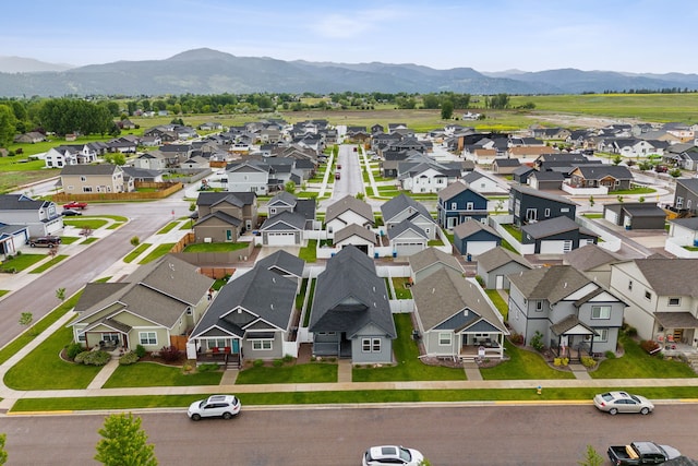 bird's eye view featuring a residential view and a mountain view