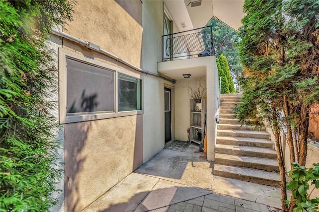 doorway to property with a balcony