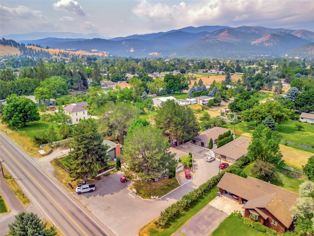 drone / aerial view featuring a mountain view