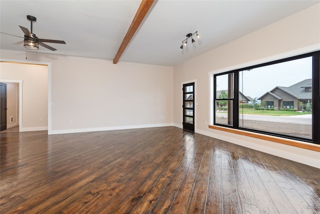 empty room with ceiling fan, beamed ceiling, and dark wood-type flooring