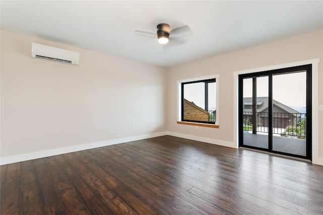 unfurnished room featuring a wall unit AC, ceiling fan, and dark hardwood / wood-style flooring