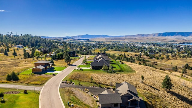 bird's eye view with a mountain view