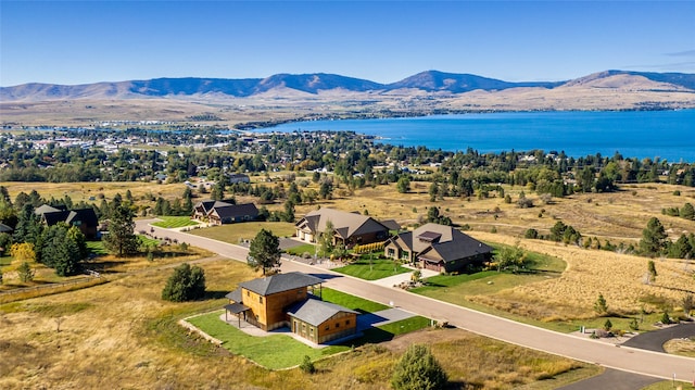 aerial view with a water and mountain view