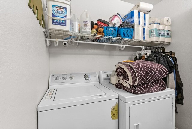 laundry room with independent washer and dryer