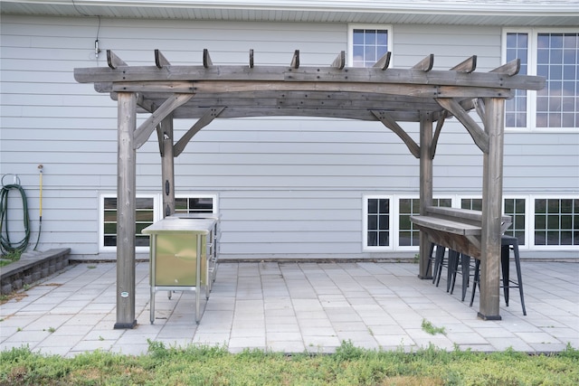 exterior space featuring a pergola