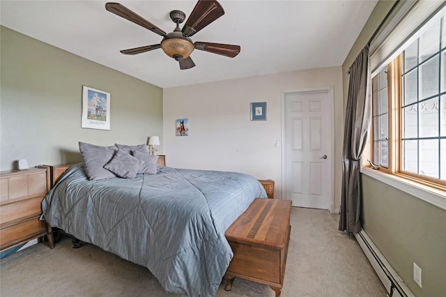 bedroom featuring a baseboard radiator, a ceiling fan, and light colored carpet